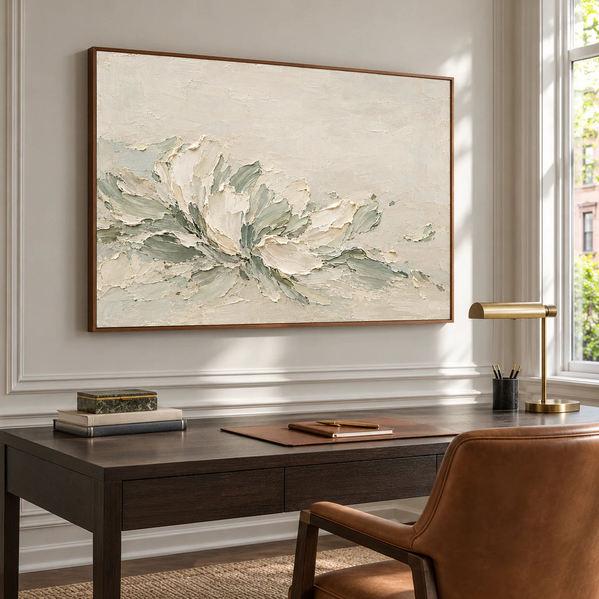Ivory and sage abstract painting above a dark desk with a leather chair in a bright office with pale gray walls, viewed from the right.