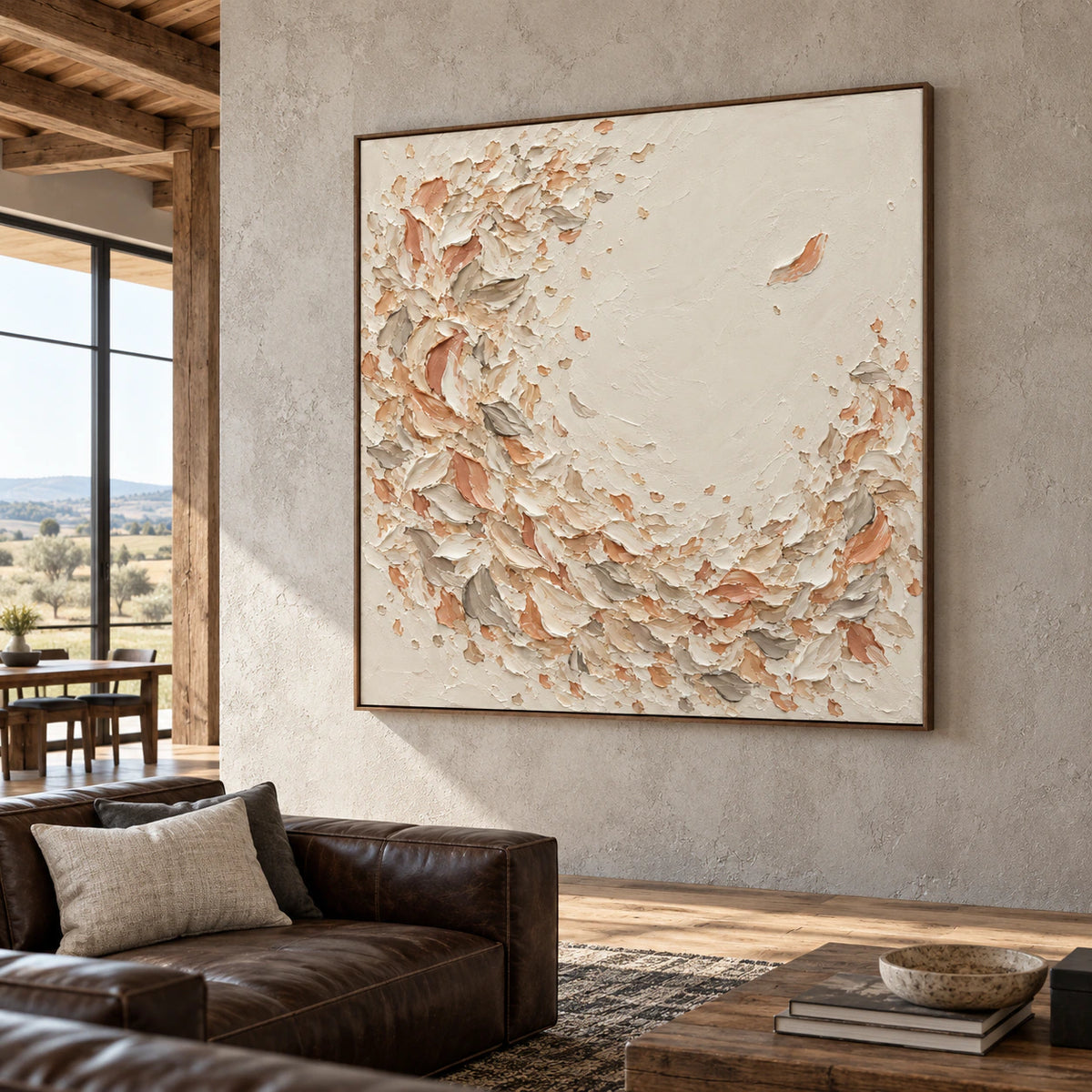 Oversized square painting displayed as the focal point in a sunlit loft lounge with concrete architecture, dark leather seating, and generous open space.