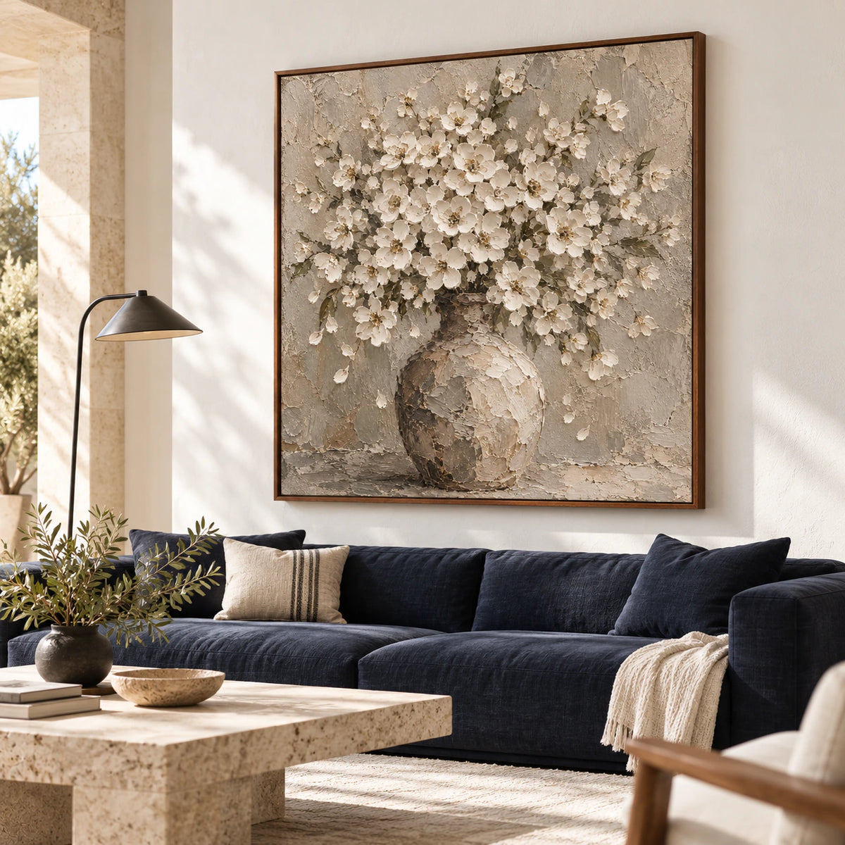 Square Petal-Relic floral painting above a contrasting neutral sofa in a bright living room.