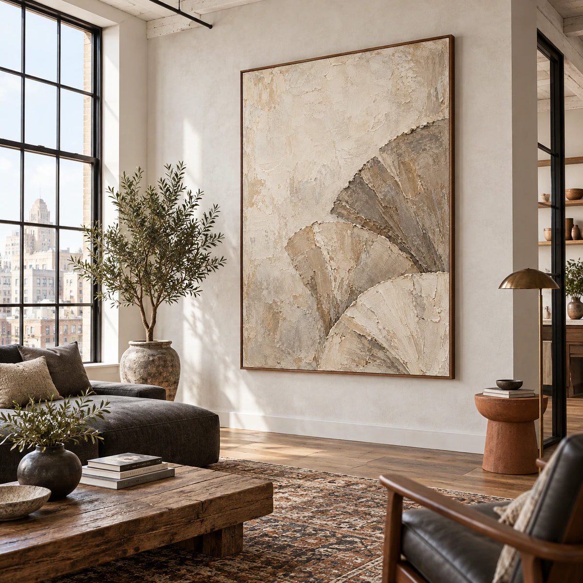 Large Plaster-Arc artwork anchoring an expansive daylight-filled loft interior.