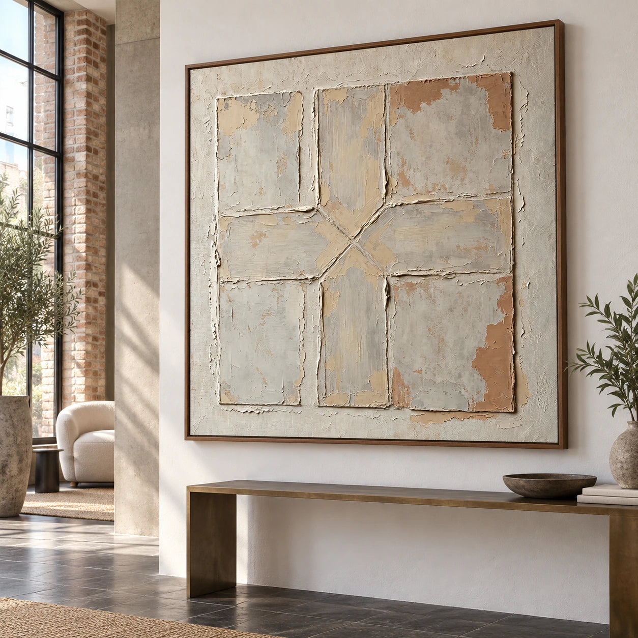 Large square textured abstract artwork in a gallery-scale foyer.