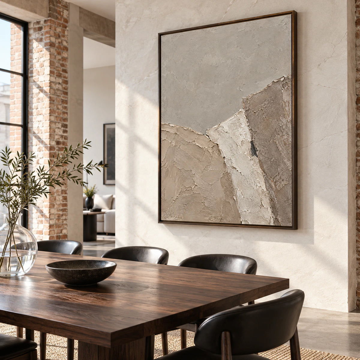 Large neutral textured abstract painting in a refined daylight dining room.