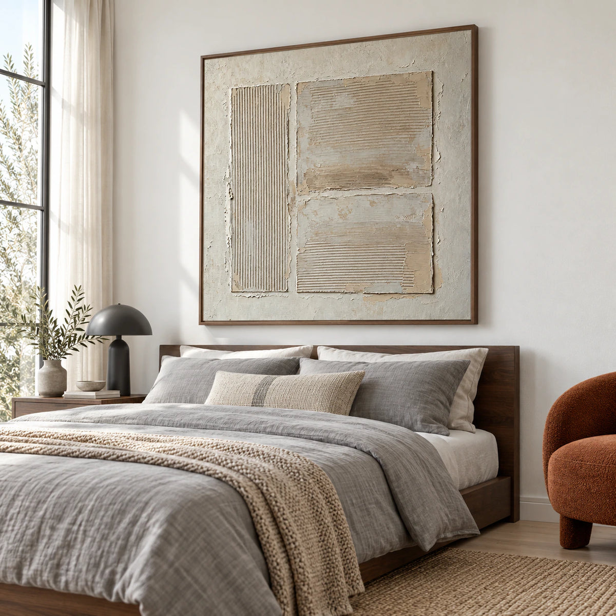 Square neutral textured artwork above a calm, airy bedroom setting.
