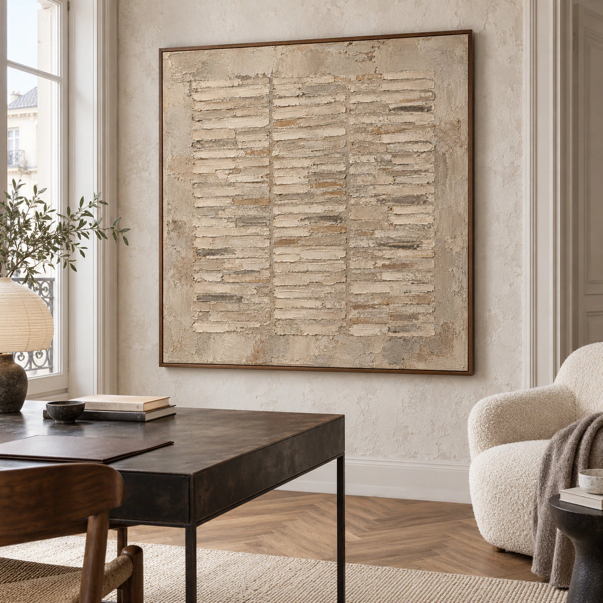 Square textured abstract painting in an airy home office reading space.
