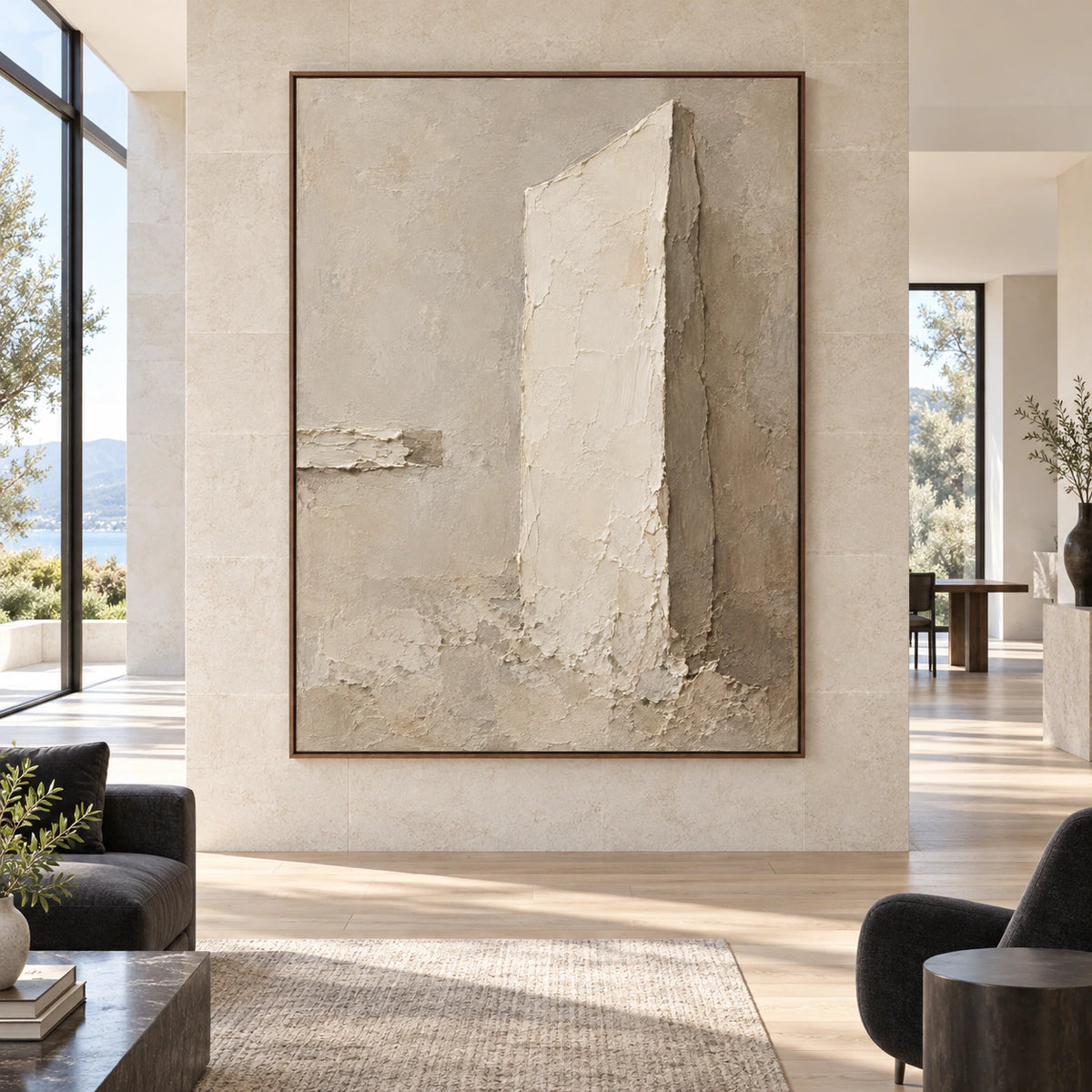 Plaster-Obelisk displayed at large scale on a bright gallery wall in an expansive interior.