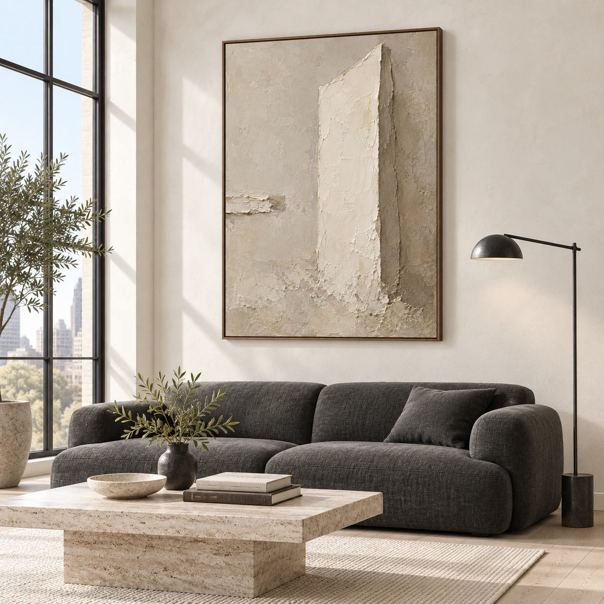 Plaster-Obelisk as a large focal artwork in a bright contemporary living room.