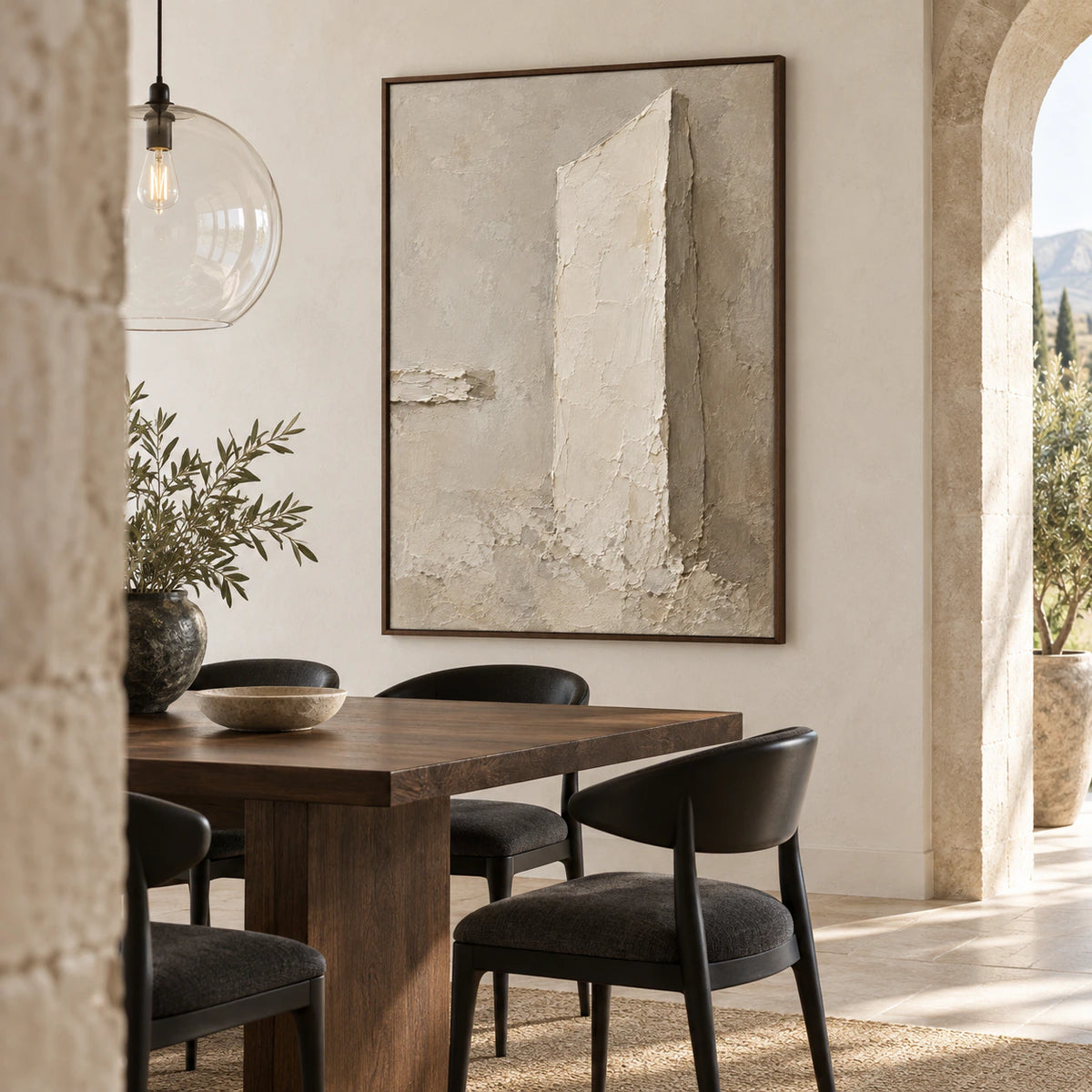 Plaster-Obelisk displayed prominently in a refined daylight-filled dining room.