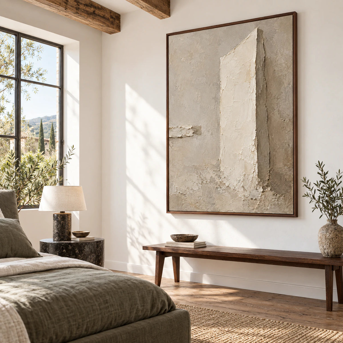 Plaster-Obelisk above a low console in a quiet, light-filled bedroom.