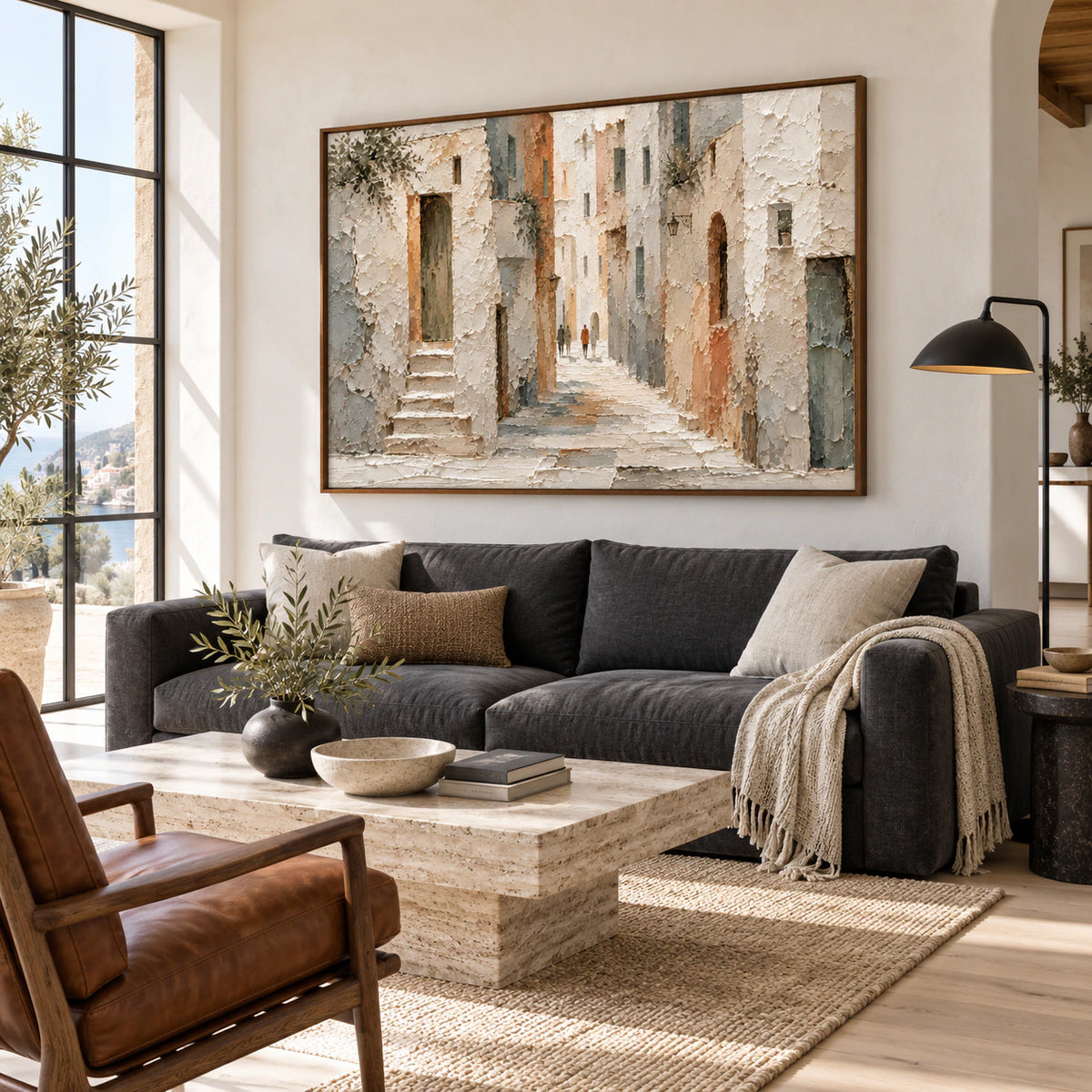 Textured passage artwork above a sofa in a bright living room.