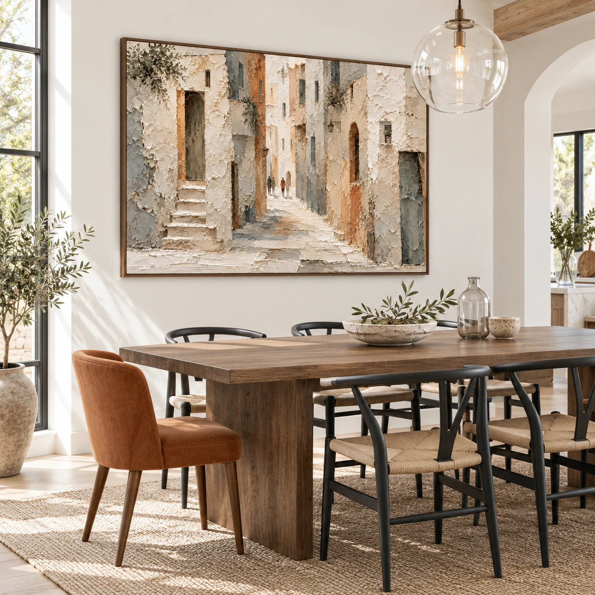 Textured architectural artwork in a refined daylight dining room.
