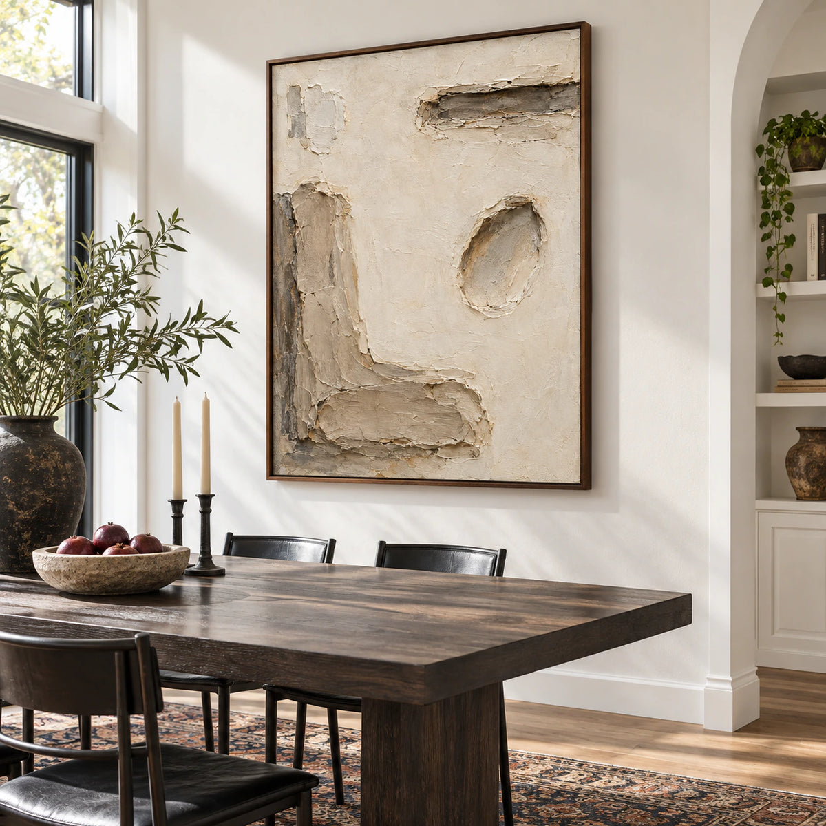 Large Plaster-Relief artwork anchoring a refined daylight dining room.
