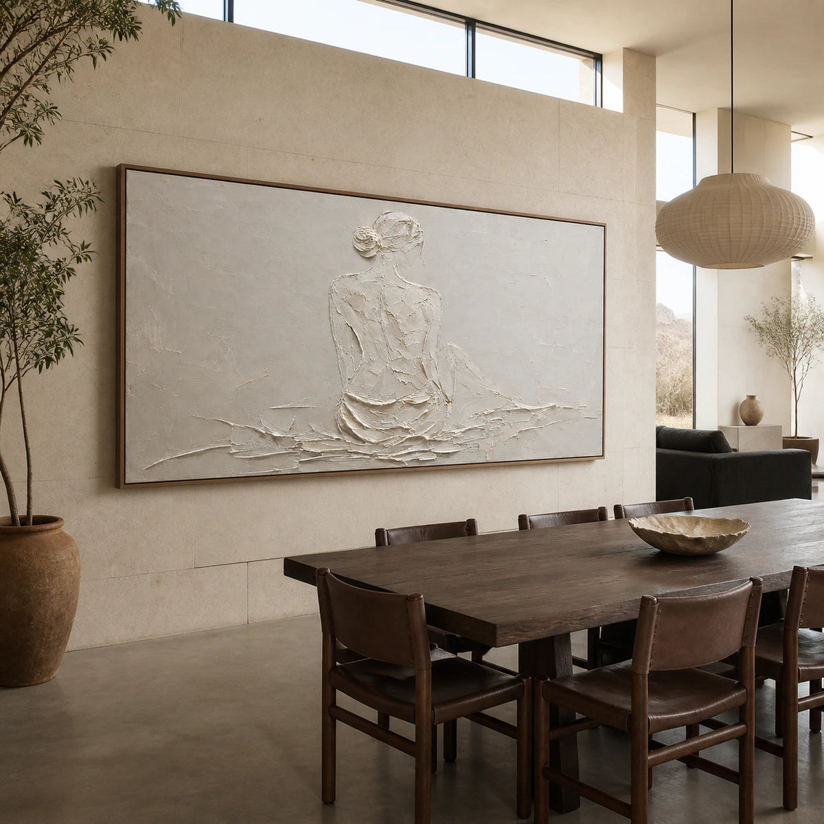 Plaster-Reverie in a refined daylight dining room with sculptural furniture.