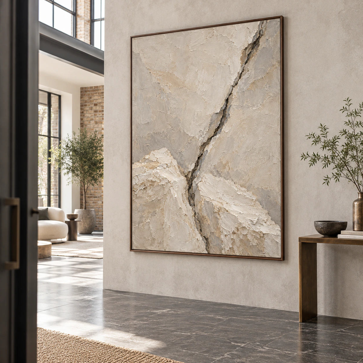 Gallery-scale ivory and grey abstract painting in a bright architectural foyer.