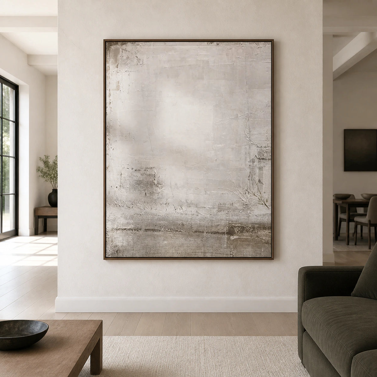 Large pale textured abstract painting displayed straight-on in a spacious gallery-like interior.