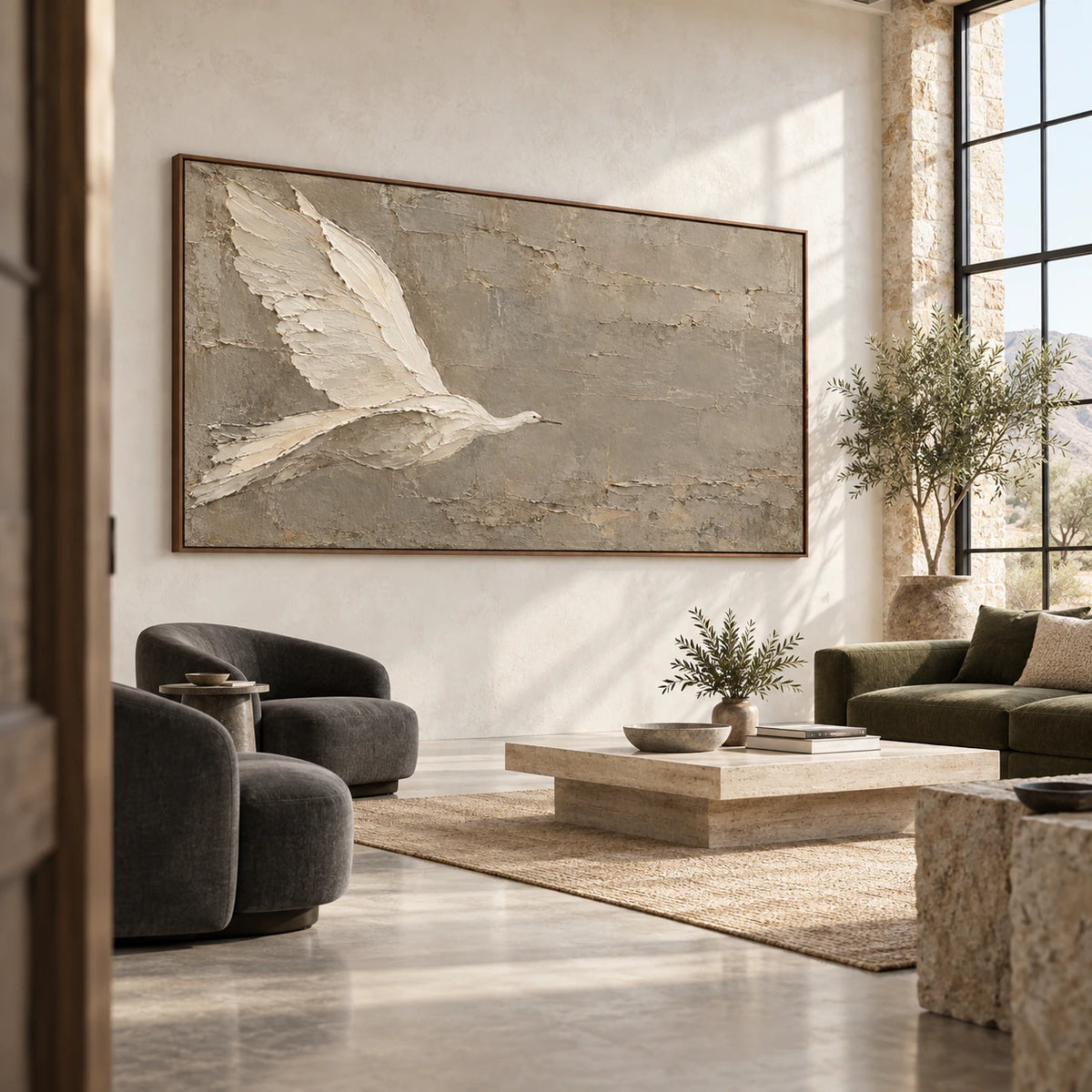 Large bird artwork in an expansive daylight-filled loft interior