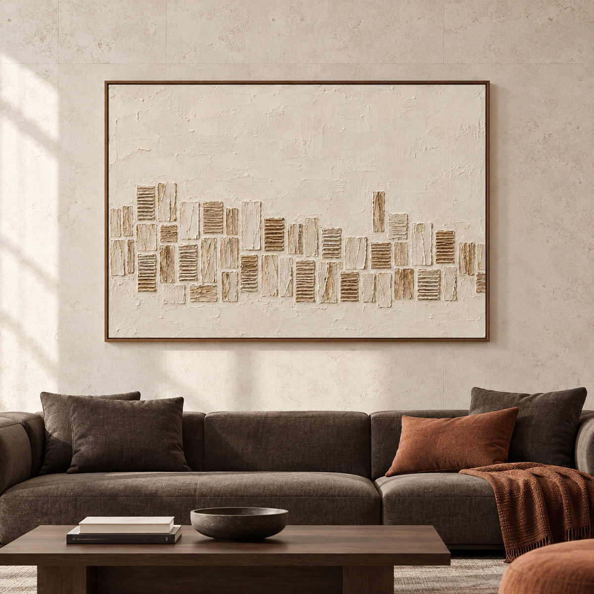 Large horizontal ivory and umber textured abstract painting displayed prominently in a bright, spacious modern room.
