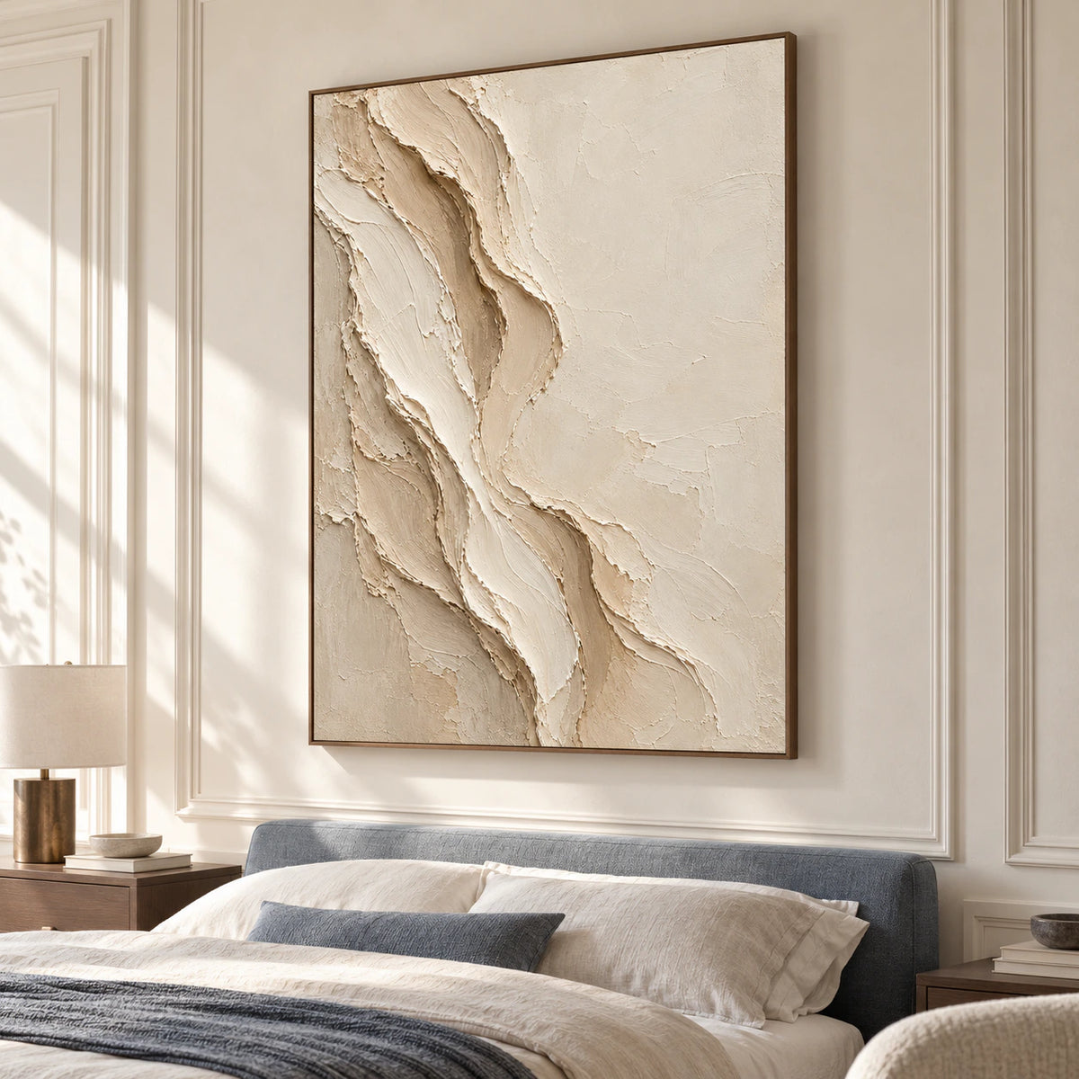 Porous-Veil brings sculptural ivory texture to a quiet bedroom above a muted blue-gray headboard.