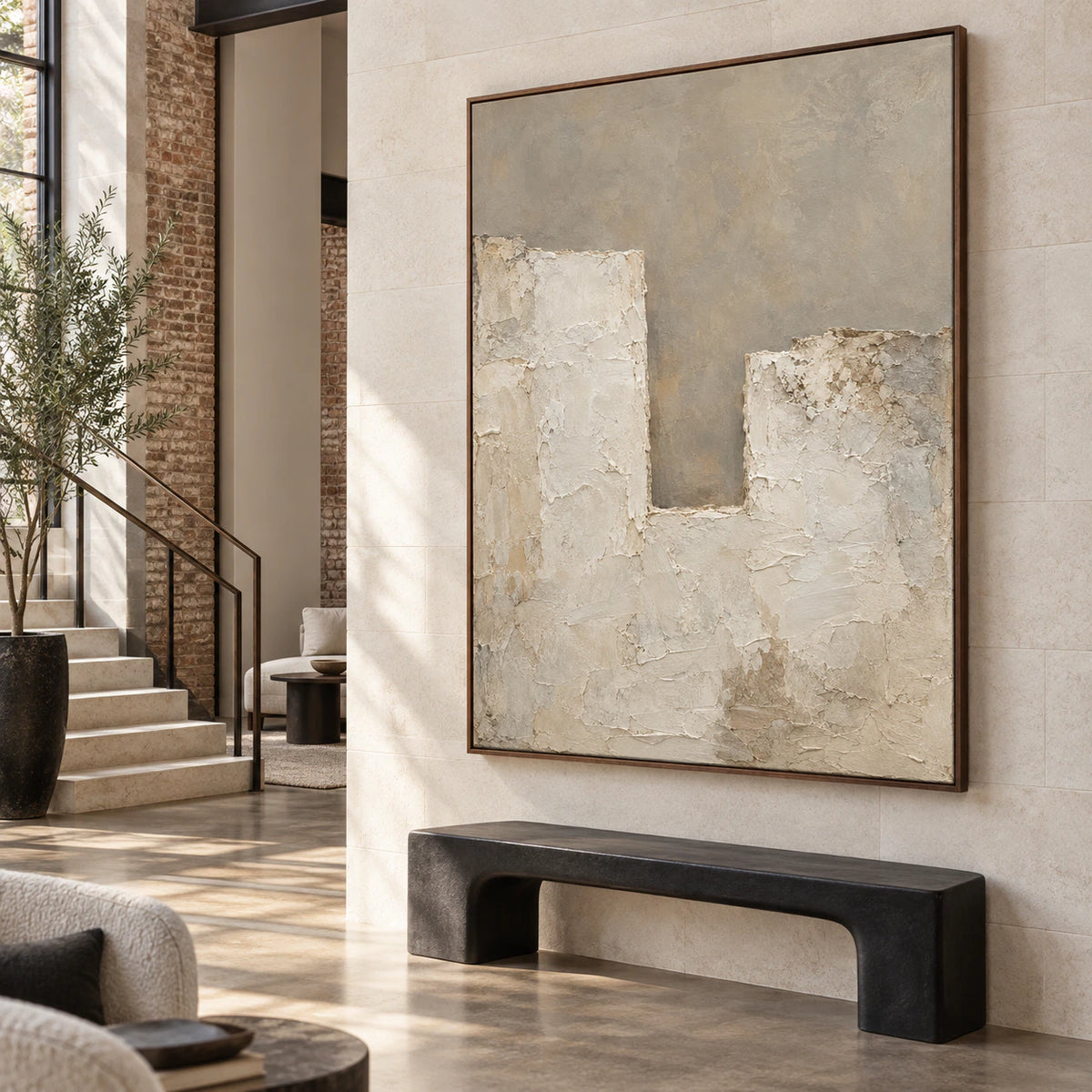 Gallery-scale textured neutral artwork in a bright sculptural foyer.