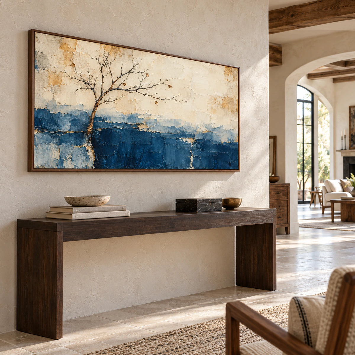 Quiet-Bough makes a gallery-scale statement in a sunlit foyer with pale stone walls, a dark console and a long view into the home.
