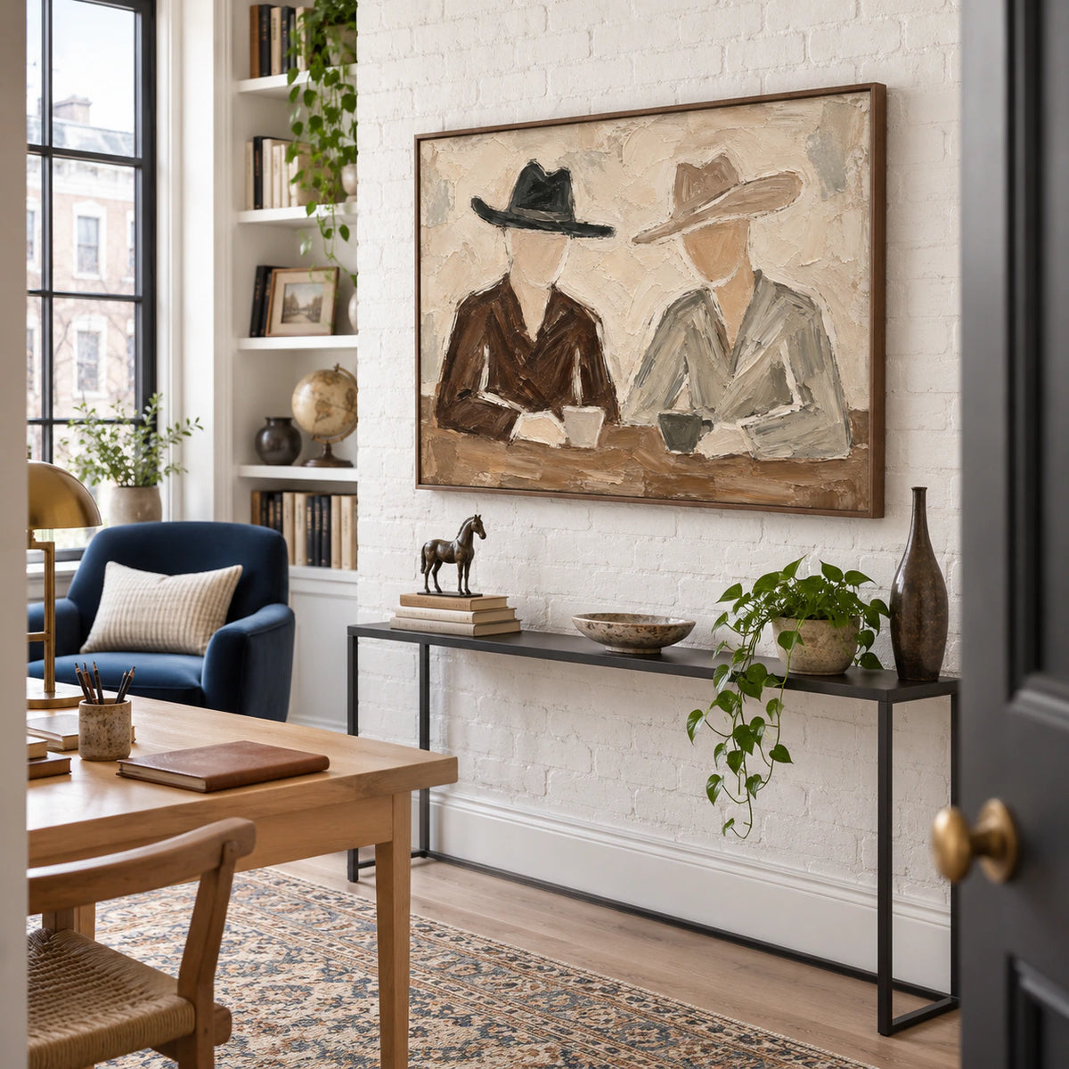 Quiet-Brims in an airy reading and home-office space with restrained furnishings.