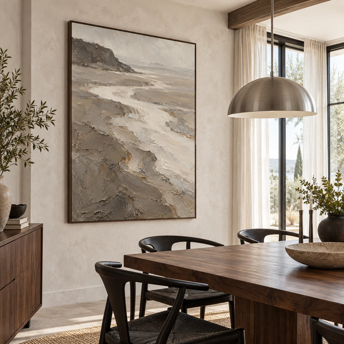 Vertical textured estuary landscape artwork in a refined daylight-filled dining room.