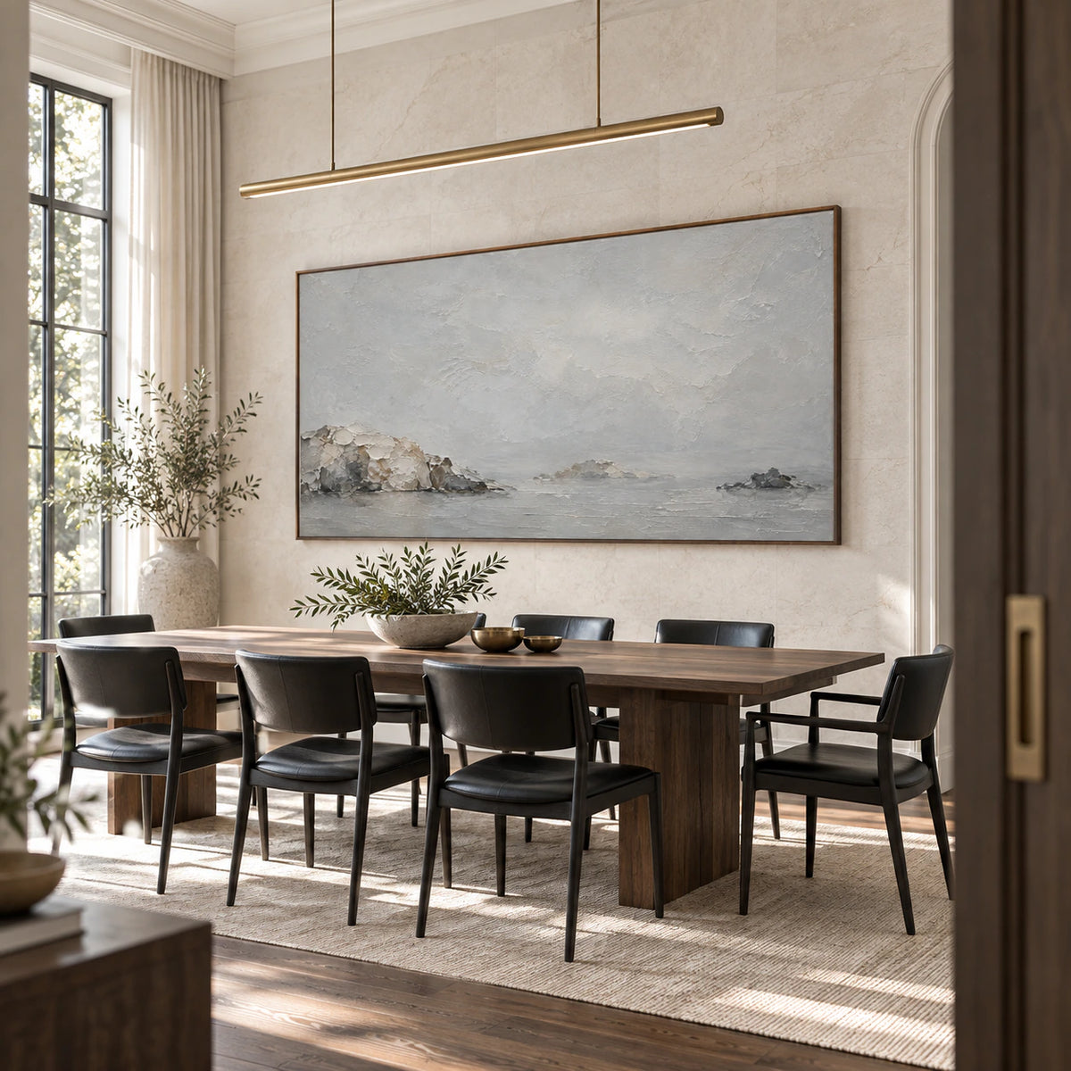 Quiet-Headland in a refined dining room with a long table and sculptural lighting.