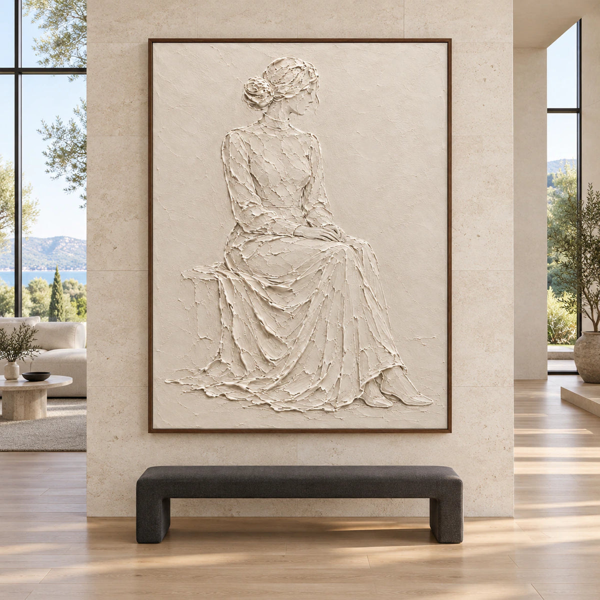 Quiet-Muse ivory relief figure artwork displayed large and straight-on in an open architectural interior.