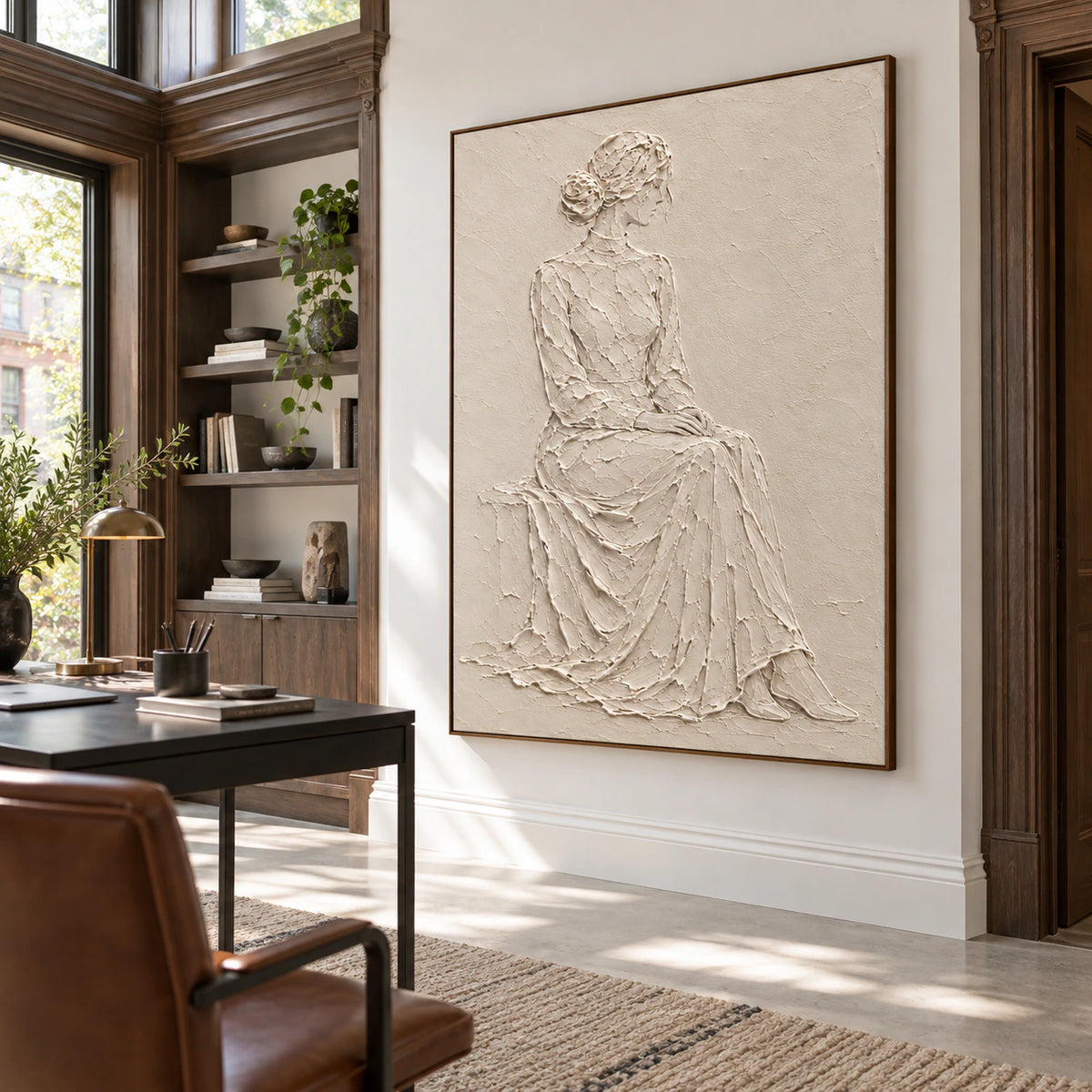 Quiet-Muse ivory sculptural wall art in an airy reading and home office space.