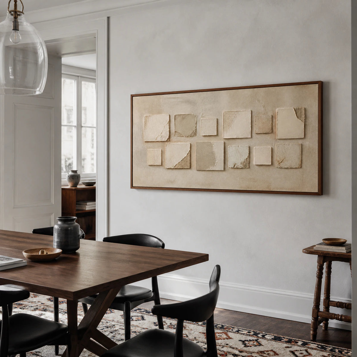 Quiet-Relief as the focal point of a refined daylight-filled dining room.