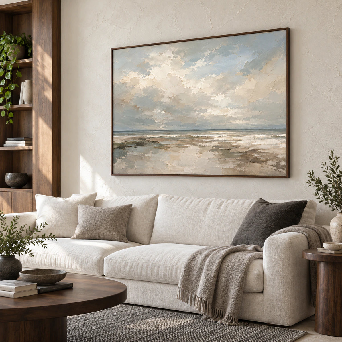 Quiet-Tide as the focal point above a sofa in a bright living room.