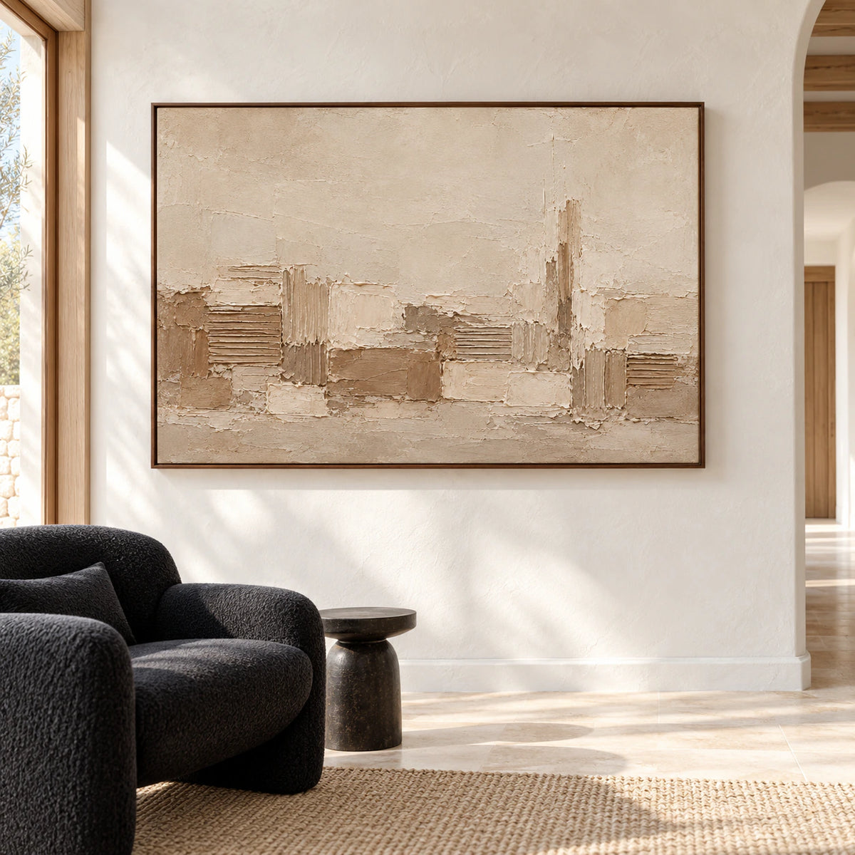 Large Raked Passage artwork makes a gallery-scale focal point in a bright foyer with a limestone floor and restrained dark furnishings.