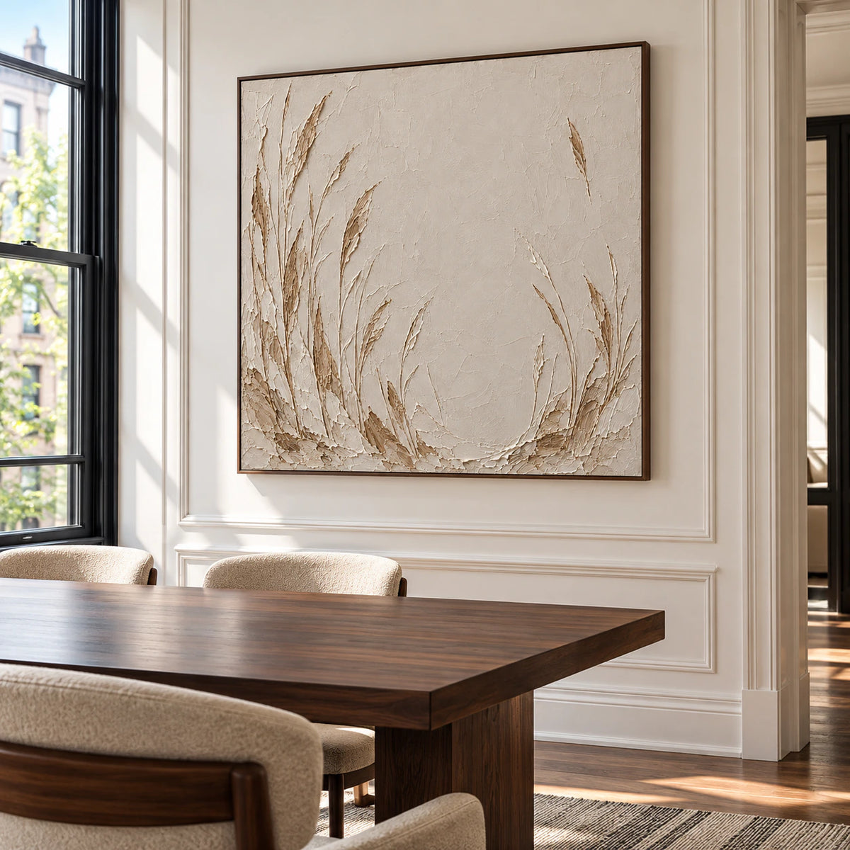 Square ivory and taupe reed painting above a dark walnut dining table, viewed from a slight left angle in a bright dining room with tall windows.
