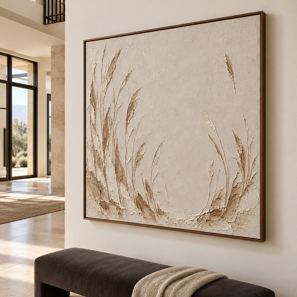 Large square ivory and taupe reed painting in a foyer with limestone flooring, dark bronze details and a glazed entry, viewed from an elevated right angle.