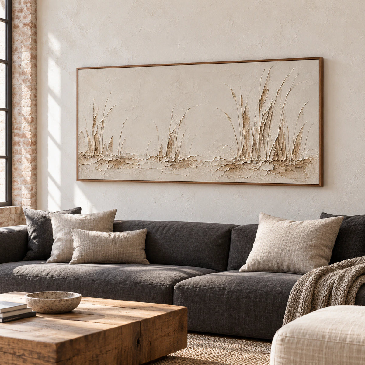 Reedlight Passage artwork above a low sofa in a bright living room.