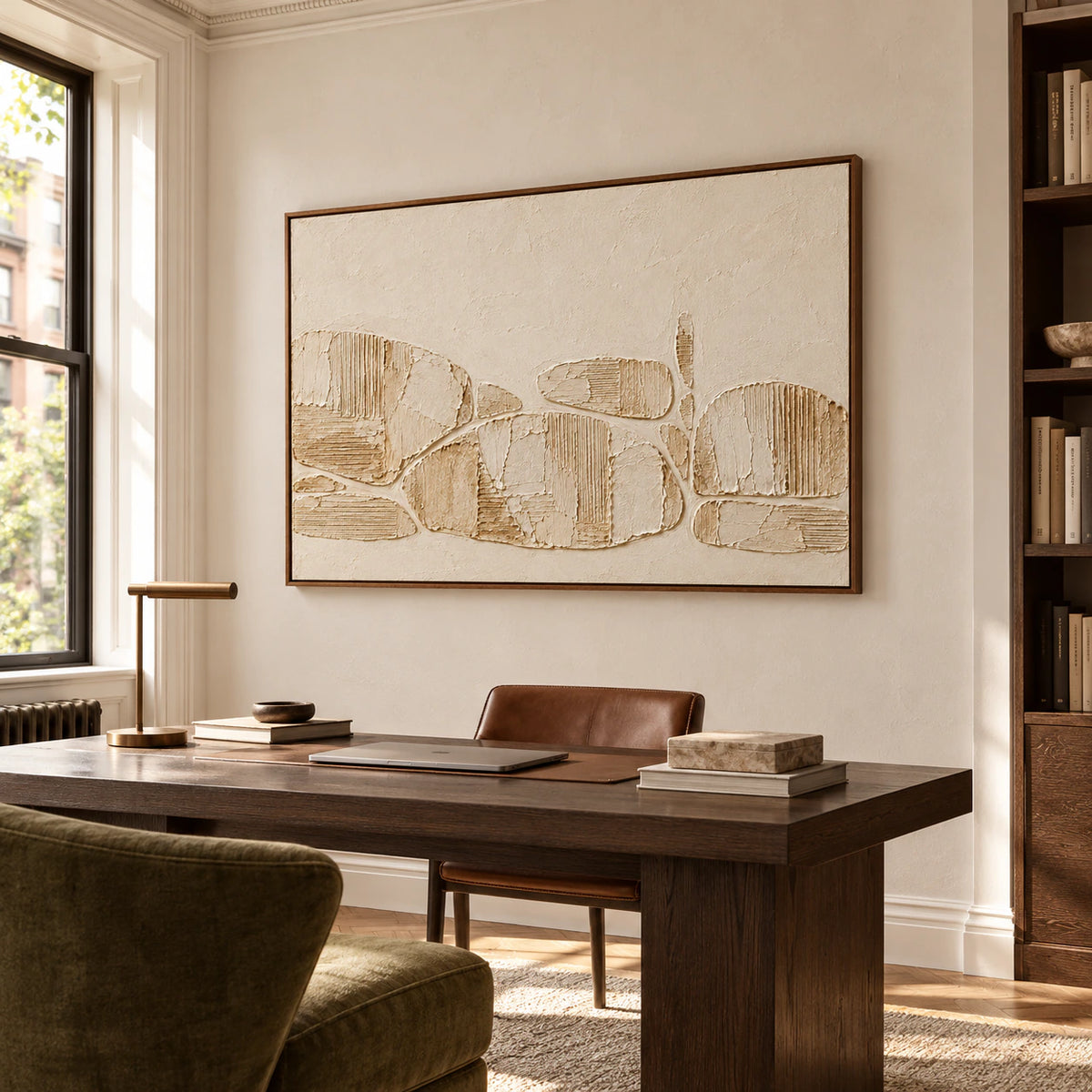 Ribbed Traverse anchoring a bright home office with a dark desk, open shelving, and a reading chair.