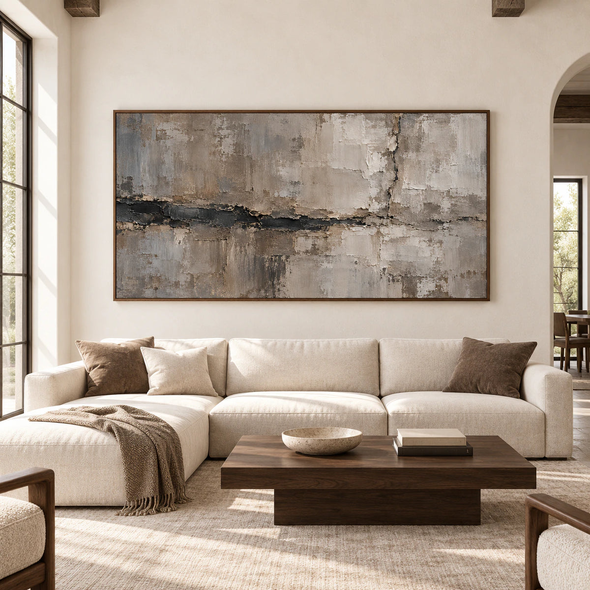 Riven-Mantle on a warm-white wall in a bright, spacious living room with dark wood and neutral furnishings, viewed straight-on.