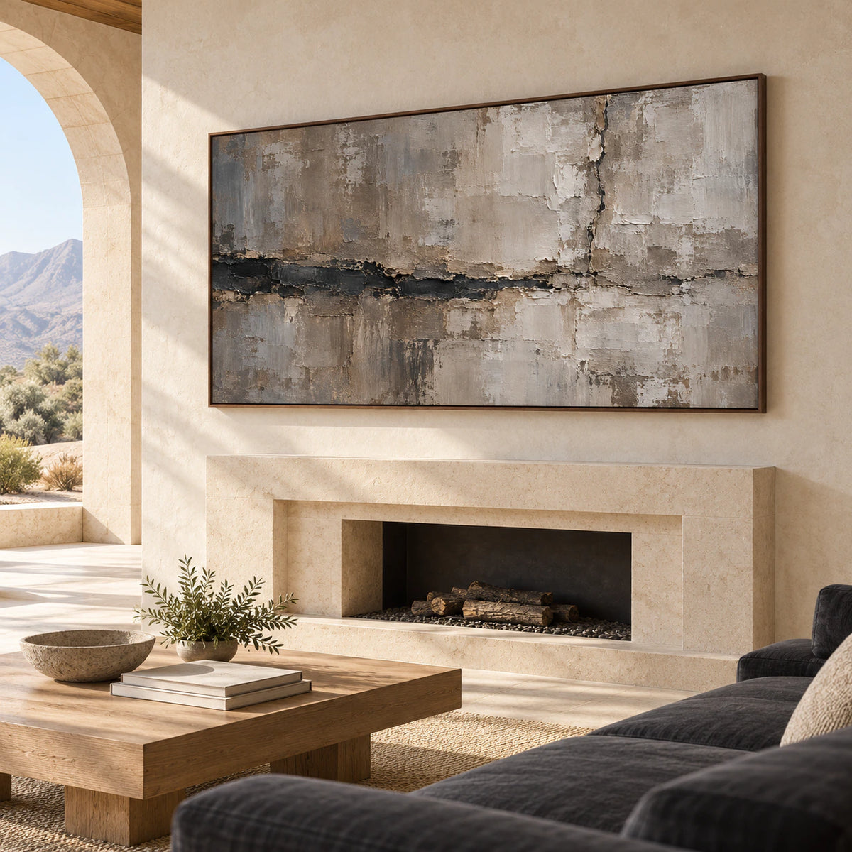 Riven-Mantle above a pale limestone fireplace in a bright living room with an ivory sofa, muted green accents and light oak, viewed from the left.