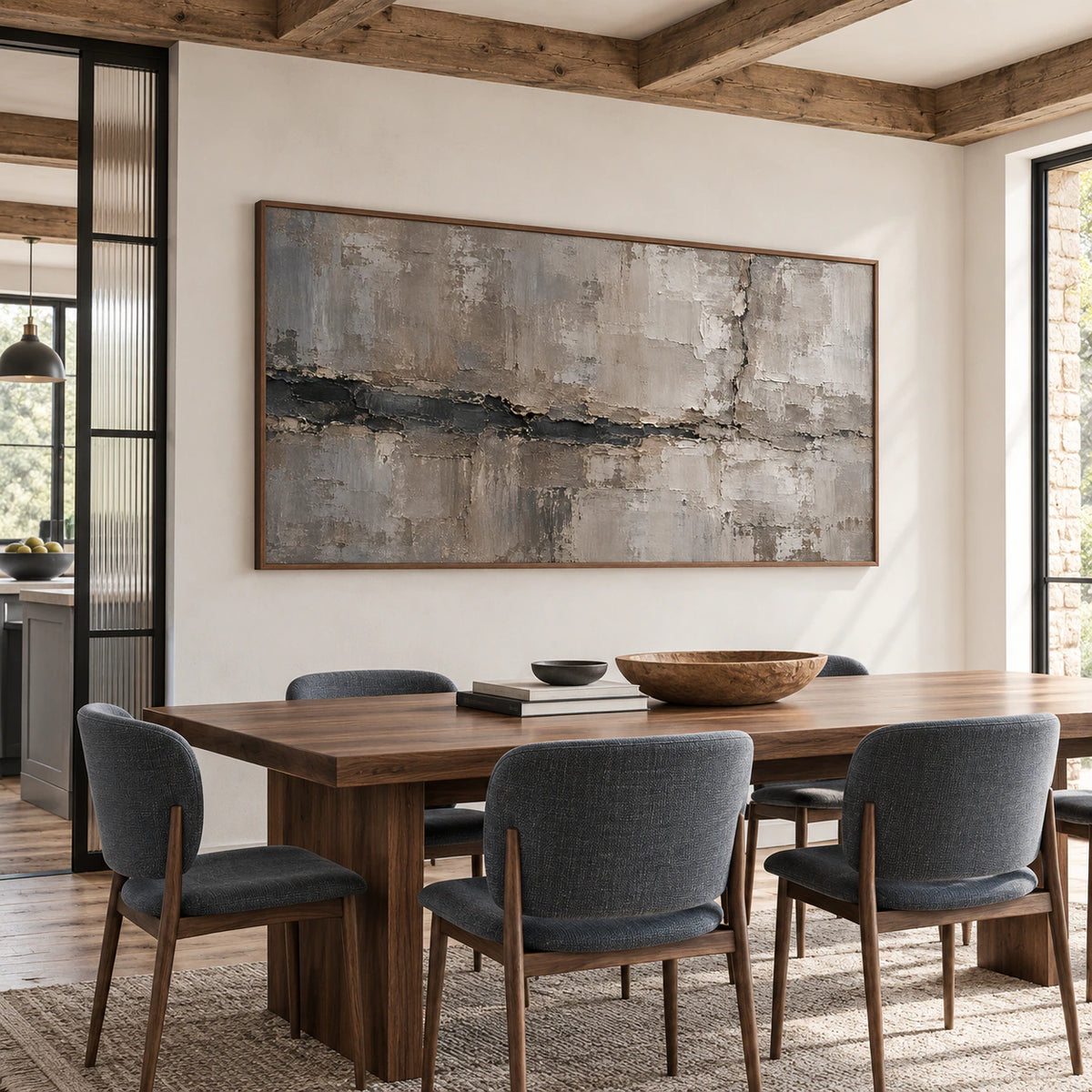 Riven-Mantle above a long walnut dining table with slim upholstered chairs and a fluted glass partition, viewed from the right.