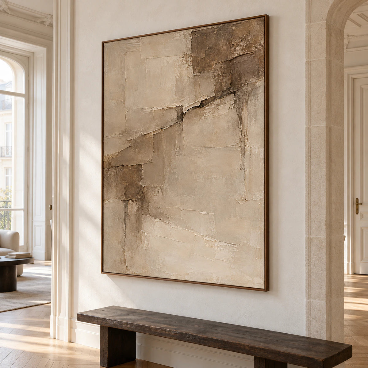 Riven-Parchment artwork at gallery scale in a bright foyer with pale stone walls and a spare bench.
