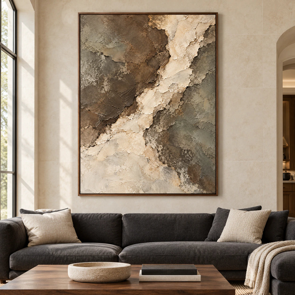 Riven-Passage viewed straight-on in a bright, spacious living room with pale limestone walls, charcoal seating and natural wood accents.