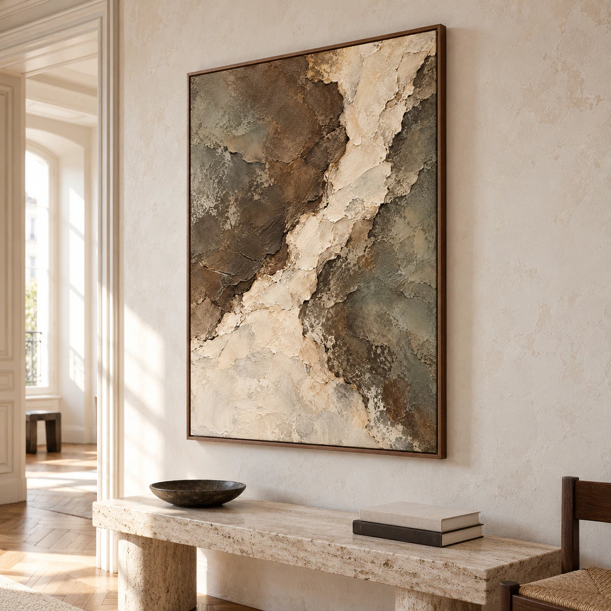 Riven-Passage viewed from the left in a bright gallery-style foyer with a wood floor, tall doorway and sculptural console.