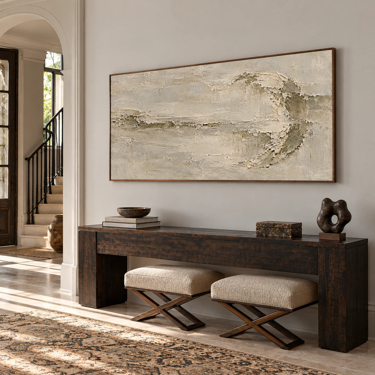 Riven-Wake displayed at gallery scale in a bright, open foyer with stone flooring and architectural height.