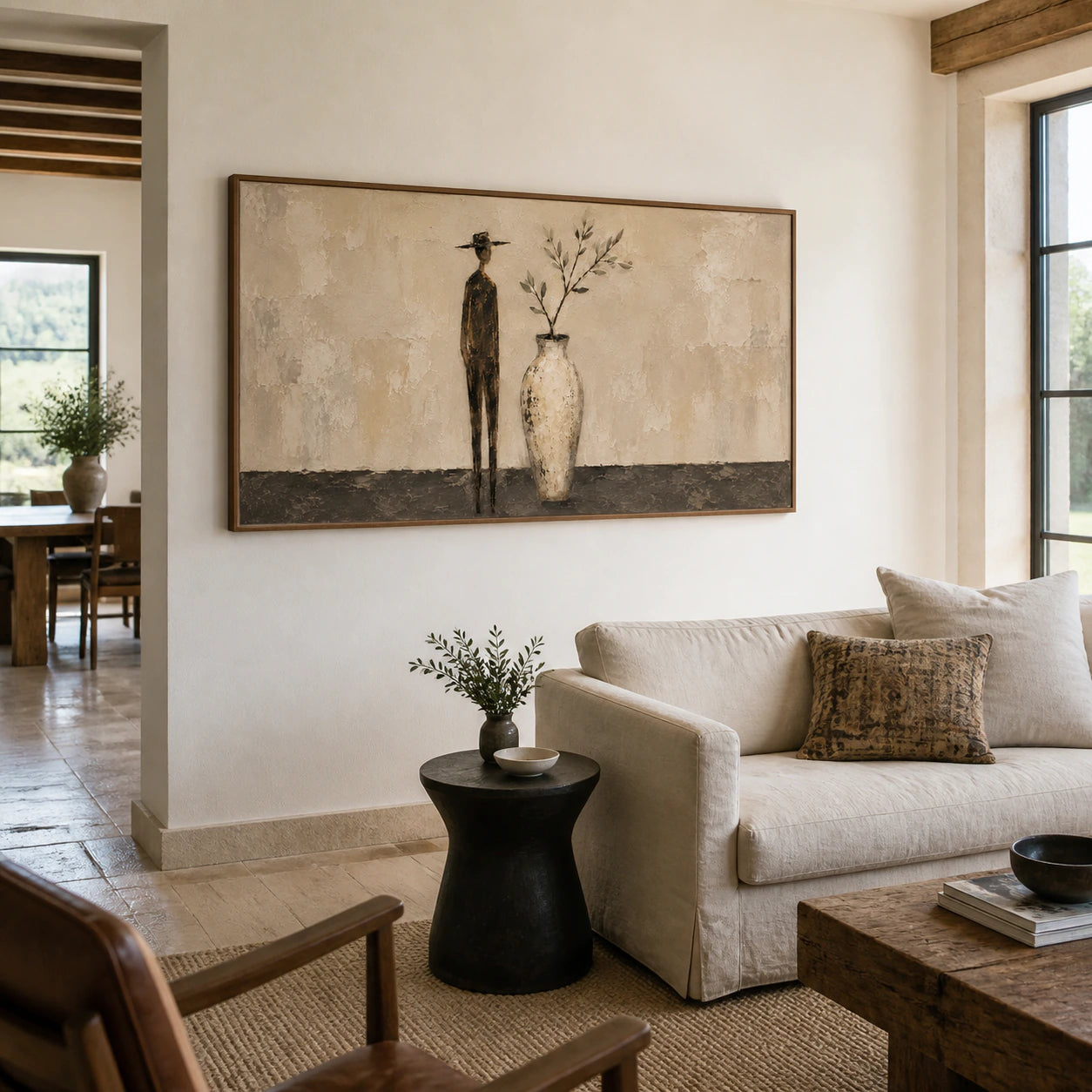 Sable-Branch above a restrained sofa in a bright contemporary living room.