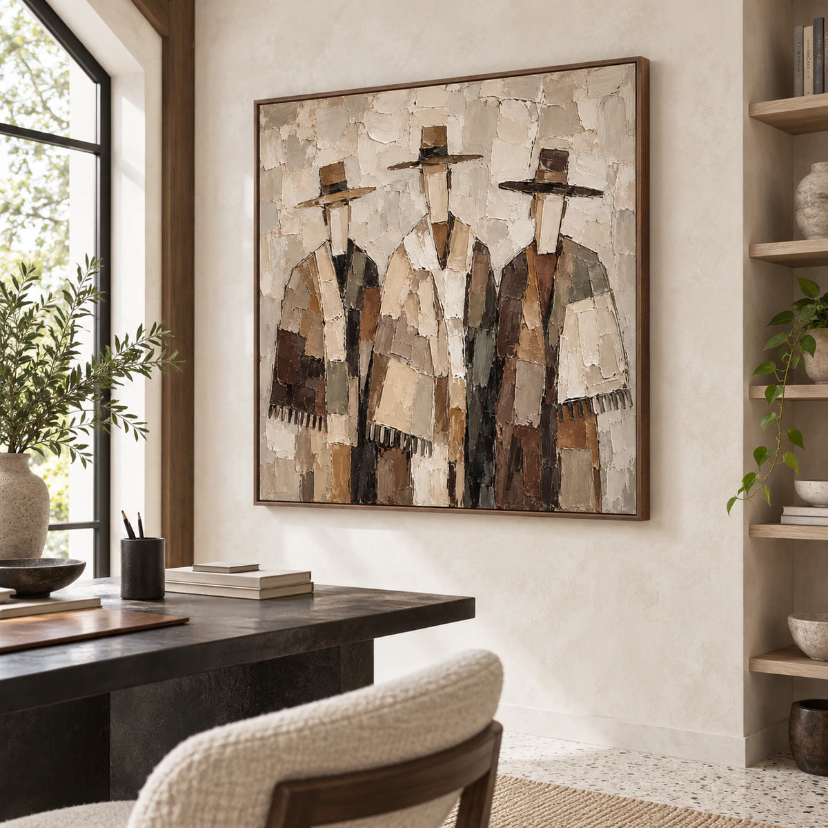 Textured figure artwork in an airy reading office with daylight and pale timber shelving.