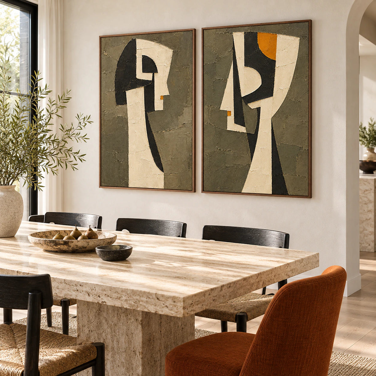 Refined dining room with the Sable-Relics two-canvas vertical diptych as the focal point.