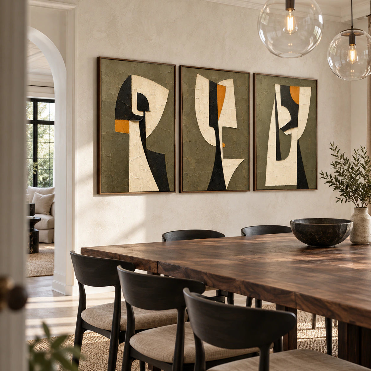 Refined dining room featuring the framed Saffron-Partition triptych.