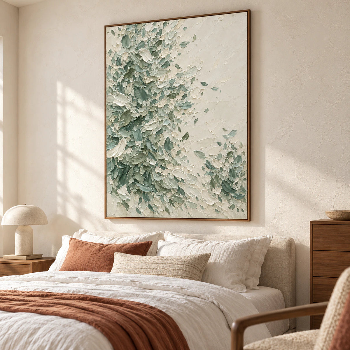 Large vertical abstract painting above a low bed in a quiet, daylight-filled bedroom with neutral linens.