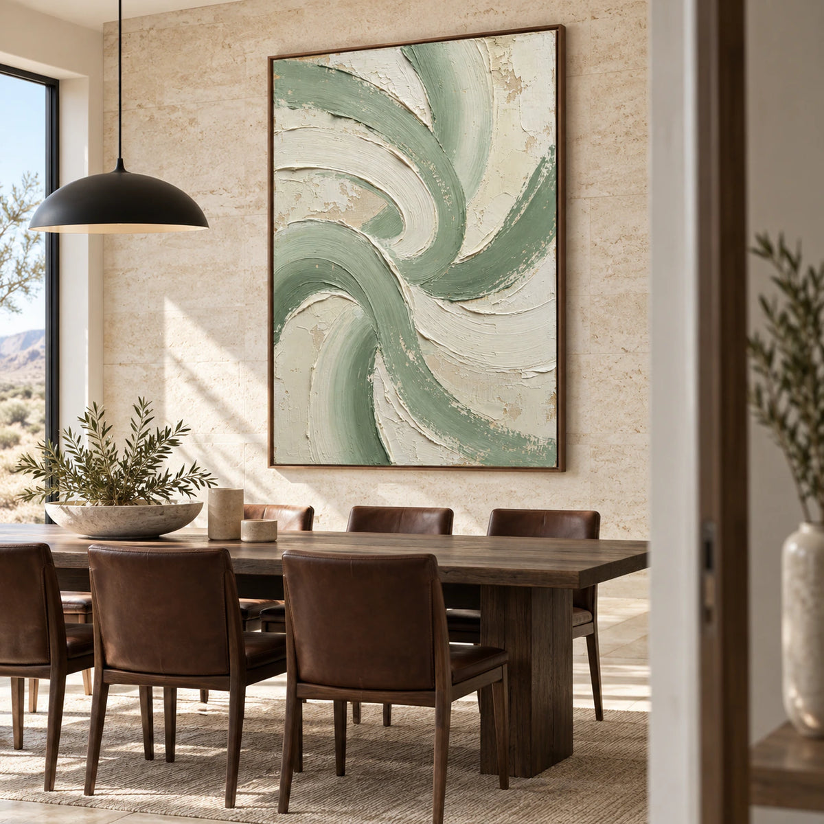 Large Sage-Rhythm artwork above a refined dining setting in natural daylight.