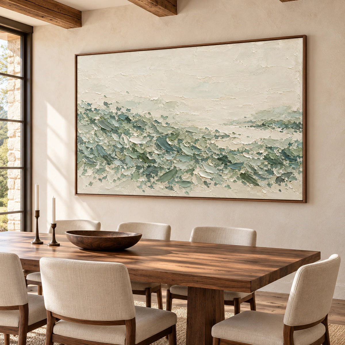 Horizontal textured abstract artwork above a long walnut dining table in a refined dining room, viewed from the right at seated height.