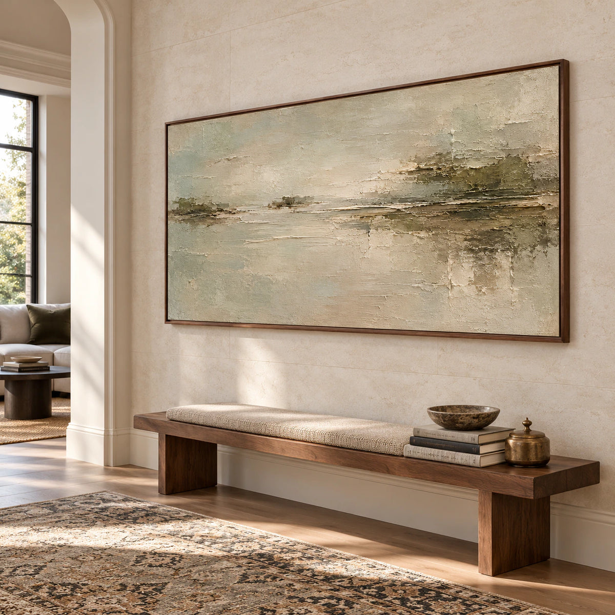 Sanded-Passage on a tall pale stone wall in a spacious foyer with a restrained bench and clerestory daylight, viewed from a low left angle.